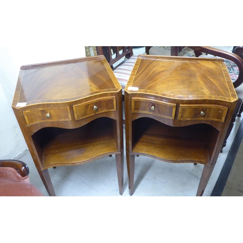 286 - A pair of modern mahogany and string inlaid serpentine front bedside cabinets, each having two short... 