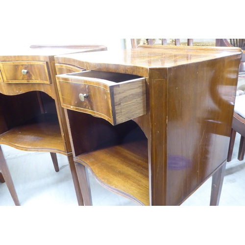 286 - A pair of modern mahogany and string inlaid serpentine front bedside cabinets, each having two short... 