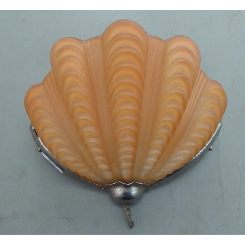 290 - A 1930s Art Deco chromium finished wall light with an amber glass shell design shade  11