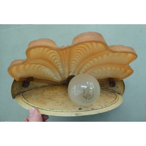 290 - A 1930s Art Deco chromium finished wall light with an amber glass shell design shade  11