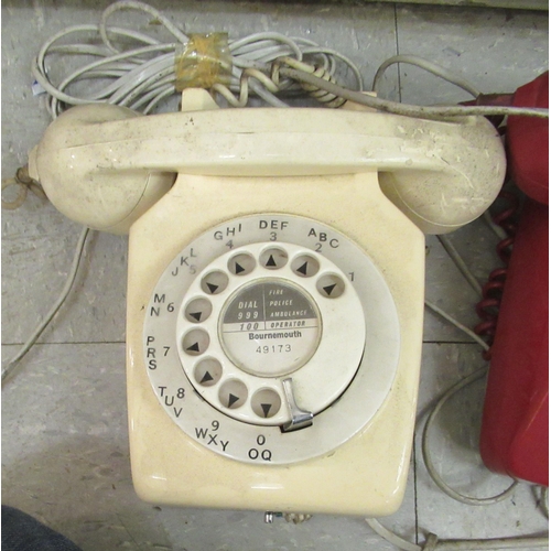 300 - Three vintage telephones: to include a red British Telecom example