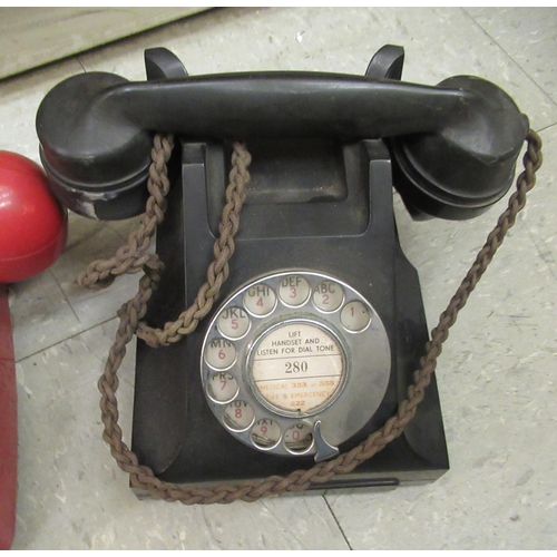 300 - Three vintage telephones: to include a red British Telecom example