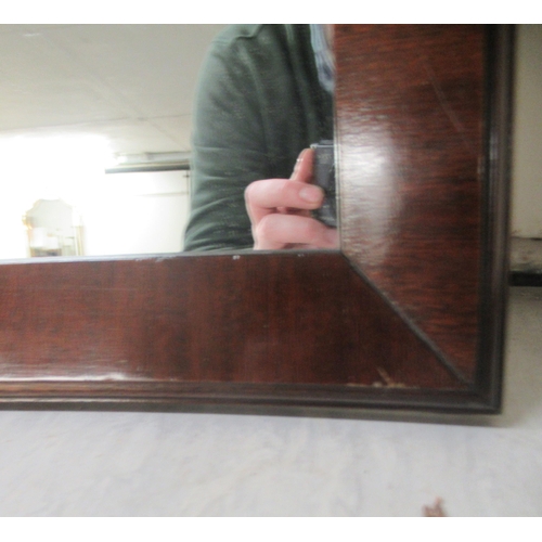 302 - A modern mirror, set in a mitred mahogany finished frame  36