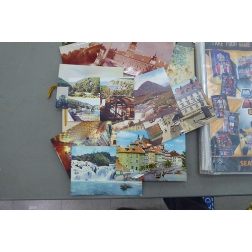 310 - Printed collectables, comprising postcards, football and Pokemon cards