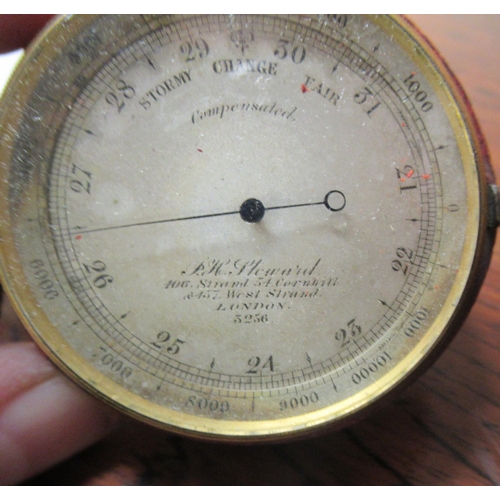 49 - An early 20thC brass cased pocket barometer, inscribed PH Steward of West Strand, London  the dial 2... 