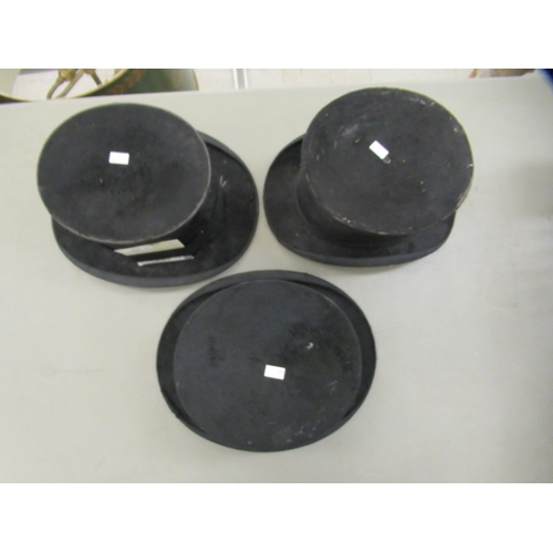 66 - Three black silk top hats  various makers  largest 23.5