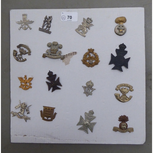 70 - Sixteen regimental cap badges and other insignia, some copies: to include 10th Royal Hussars, East L... 