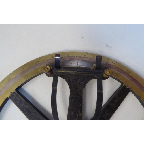 72 - A mid 19thC Thomas Street rotating 360 degree plotting protractor with engraved calibrations and the... 