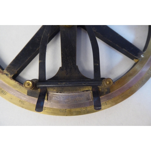 72 - A mid 19thC Thomas Street rotating 360 degree plotting protractor with engraved calibrations and the... 