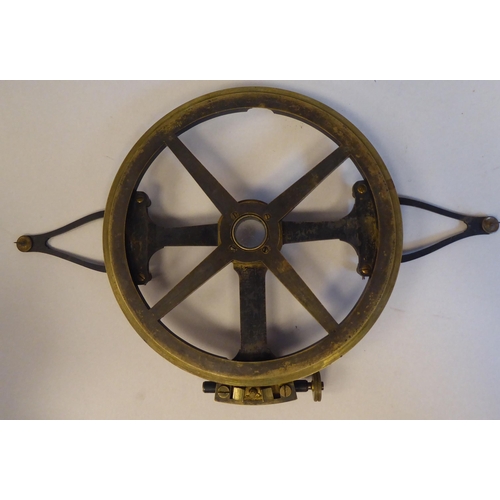 72 - A mid 19thC Thomas Street rotating 360 degree plotting protractor with engraved calibrations and the... 