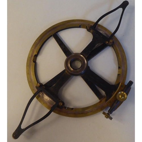 72 - A mid 19thC Thomas Street rotating 360 degree plotting protractor with engraved calibrations and the... 