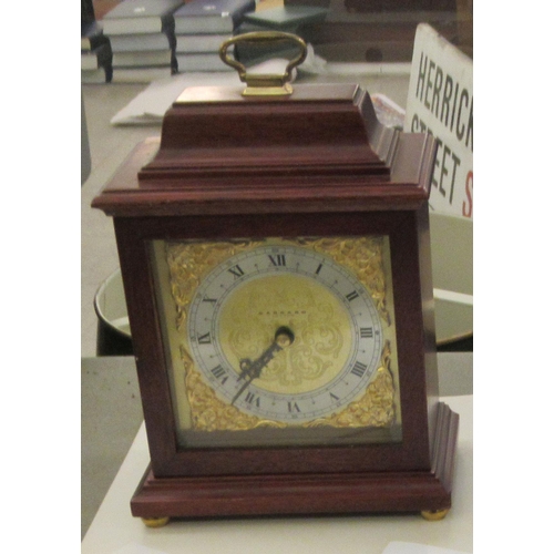 77 - A modern Garrard of London mahogany cased mantel timepiece; the movement faced by a Roman dial  9