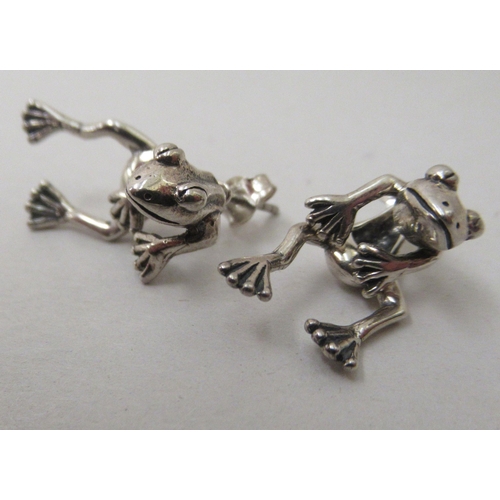 78 - A pair of silver coloured metal earrings, fashioned as frogs 