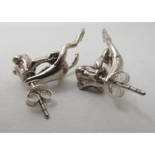 78 - A pair of silver coloured metal earrings, fashioned as frogs 