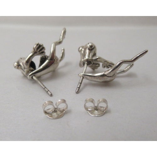 78 - A pair of silver coloured metal earrings, fashioned as frogs 