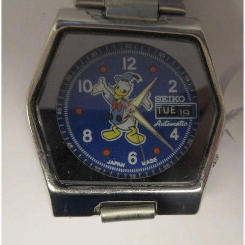 85 - A vintage Seiko automatic novelty Donald Duck stainless steel cased bracelet watch, faced by a paint... 