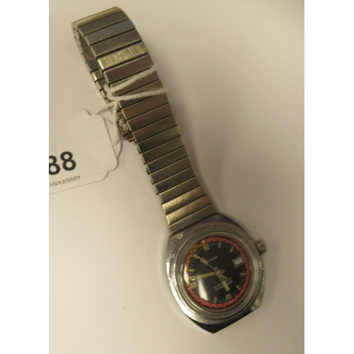 88 - A vintage Times automatic stainless steel cased divers watch, faced by a baton dial with a date aper... 