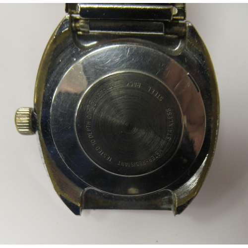 88 - A vintage Times automatic stainless steel cased divers watch, faced by a baton dial with a date aper... 