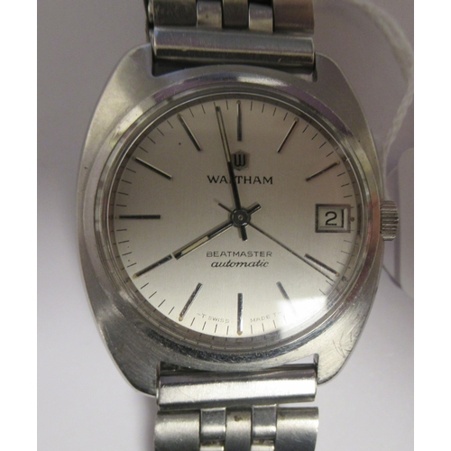 89 - A vintage Waltham Beatmaster automatic stainless steel cased bracelet watch, faced by a white baton ... 