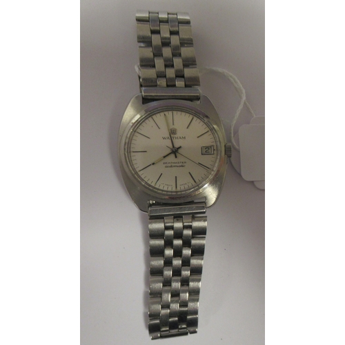 89 - A vintage Waltham Beatmaster automatic stainless steel cased bracelet watch, faced by a white baton ... 