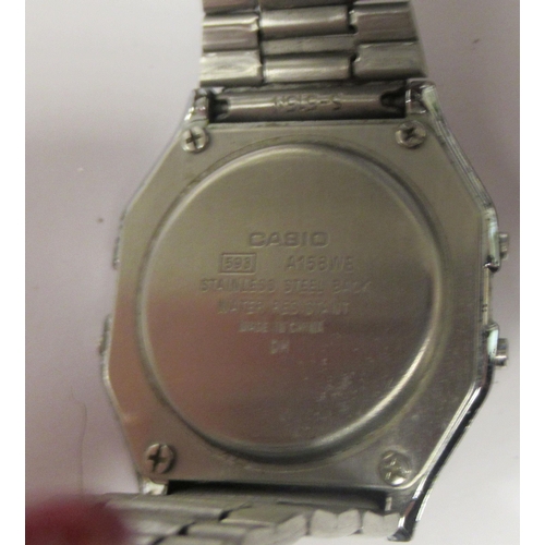 92 - Two vintage digital stainless steel cased bracelet watches, viz. a Seiko Quartz LC and a Casio WR