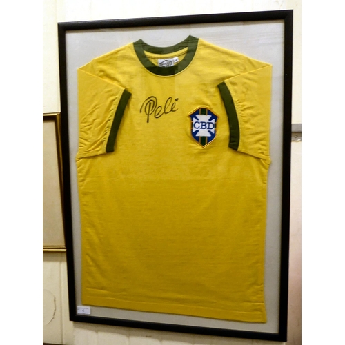 1 - A framed Brazilian football shirt  bears a pen signature  size medium  22