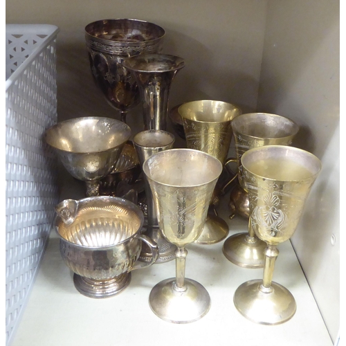 107 - Stainless steel flatware and EPNS tableware: to include a set of four pedestal goblets, sugar tongs ... 