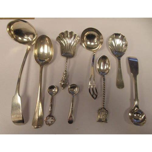 111 - Silver flatware: to include a shovel design caddy spoon; a sauce ladle with a round bowl; and a ratt... 