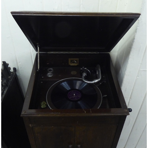 12 - A His Masters Voice, model 156, mahogany gramophone, raised on turned legs  36