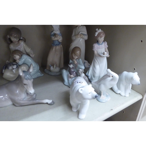 147 - Lladro and Nao porcelain figures: to include a donkey  5