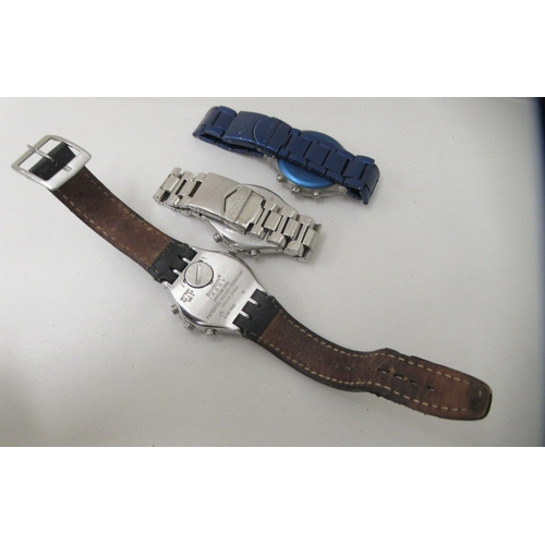 155 - Three variously cased and strapped Swatch wristwatches