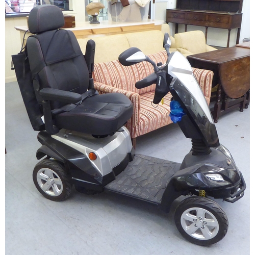 161 - A Kymco battery powered, four wheeled mobility scooter with variable speed, digital dash display, fr... 