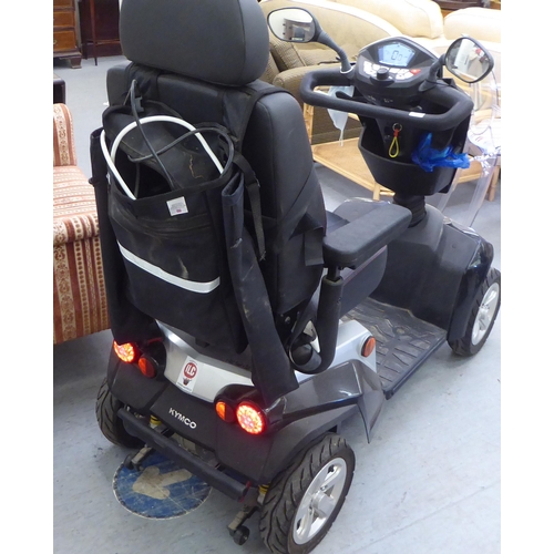 161 - A Kymco battery powered, four wheeled mobility scooter with variable speed, digital dash display, fr... 