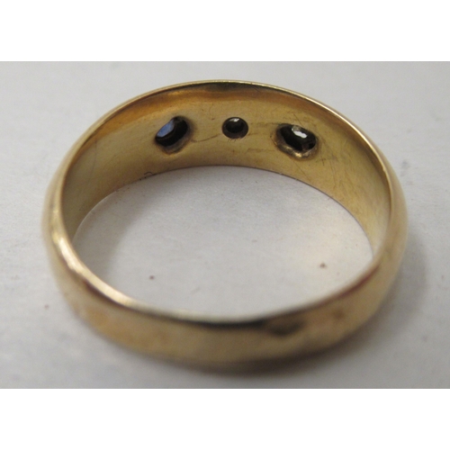 170 - An 18ct gold variously set band ring