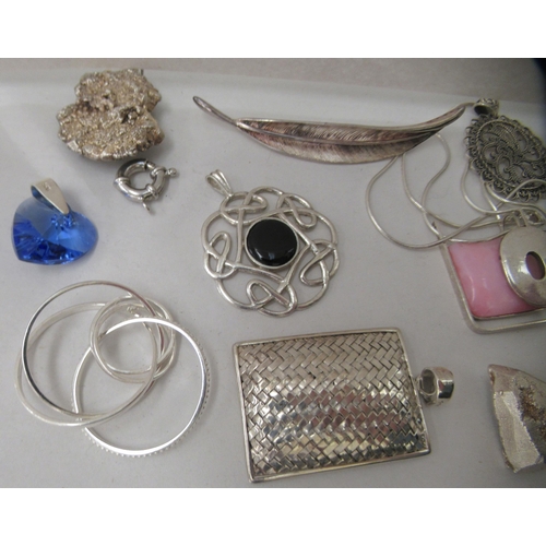 184 - Silver coloured and white metal costume jewellery: to include dress rings and pendants 