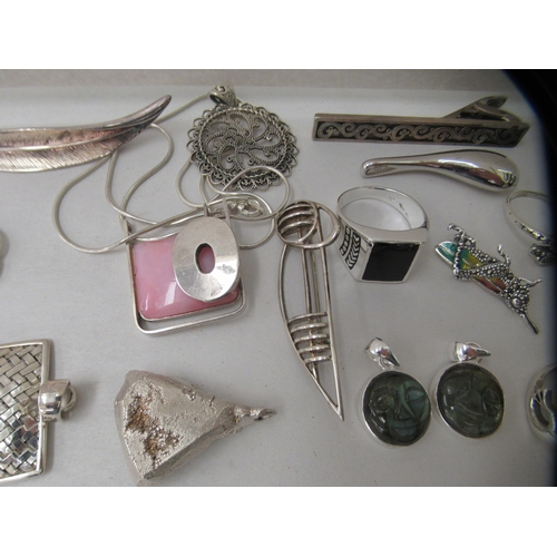 184 - Silver coloured and white metal costume jewellery: to include dress rings and pendants 