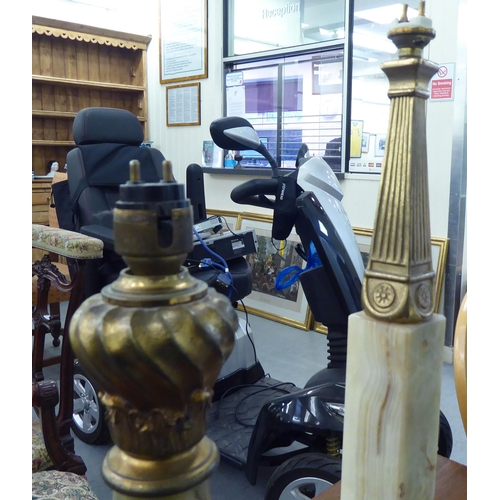 18 - Two mid 20thC table lamps: to include a brass and onyx mounted example  16