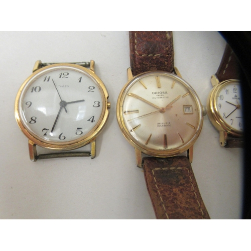 190 - Four wristwatches: to include an Oriosa Swiss made automatic, faced by a baton dial 