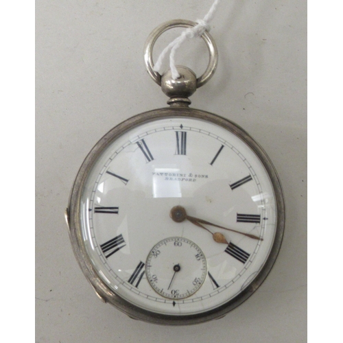 191 - A silver coloured metal pocket watch, faced by a white enamel Roman dial, incorporating a subsidiary... 