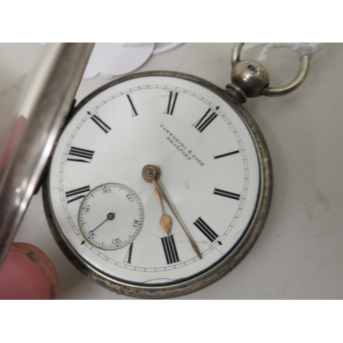 191 - A silver coloured metal pocket watch, faced by a white enamel Roman dial, incorporating a subsidiary... 