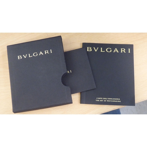 198 - A Bulgari aluminium and black rubber cased strapped wristwatch, faced by an Arabic and baton dial, s... 