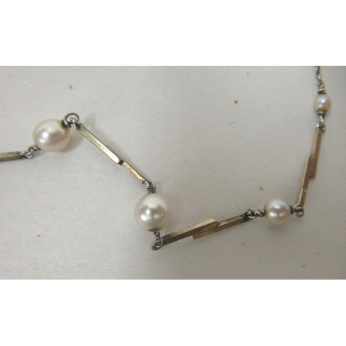 201 - A 9ct white gold seed pearl set necklet, on a ring bolt clasp  cased 