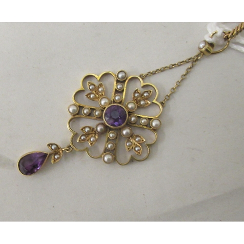 206 - A Victorian 15ct gold seed pearl and amethyst set pendant, on a curb link chain with a ring bolt cla... 