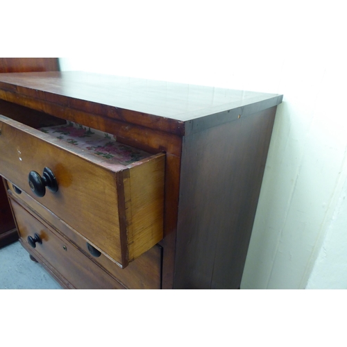 212 - A late 19thC mahogany three drawer dressing chest with bun handles, raised on turned feet  35