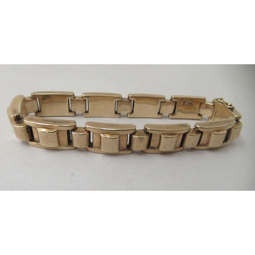 216 - A 9ct textured gold, block link bracelet 