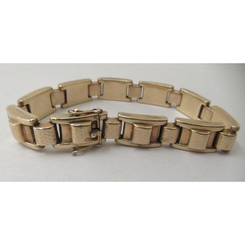 216 - A 9ct textured gold, block link bracelet 