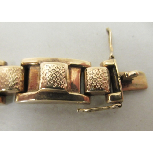 216 - A 9ct textured gold, block link bracelet 