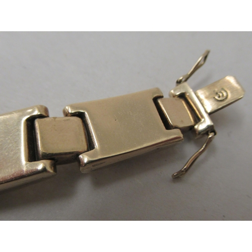 216 - A 9ct textured gold, block link bracelet 