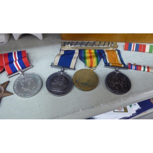 219 - WITHDRAWNA mixed lot: to include Great War 1914-1918 medal; a Victory medal; a long service and good... 