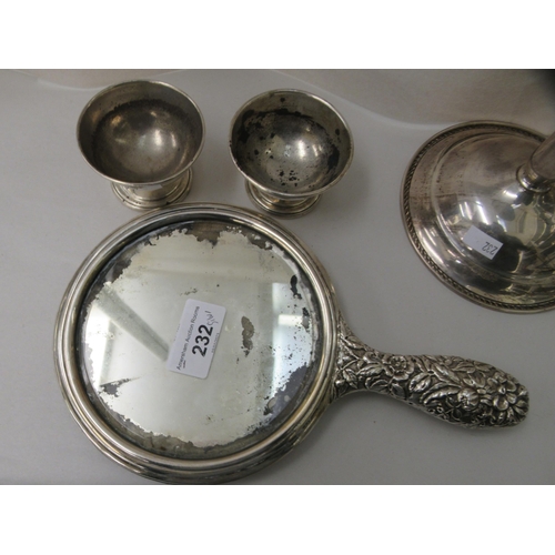 232 - Silver and white metal collectables: to include a dressing table hand mirror, elaborately decorated ... 